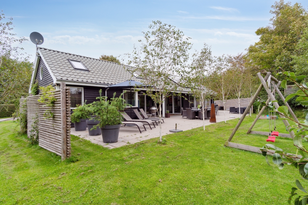 Dette lekre huset med svømmebasseng, nr. 339, med plass til 16 personer, ligger i Nordsjælland