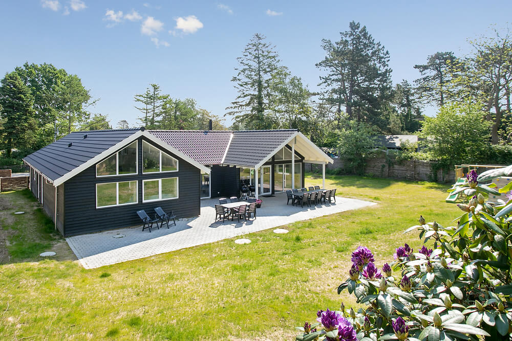 Dette lekre huset med svømmebasseng, nr. 361, med plass til 18 personer, ligger i Nordsjælland