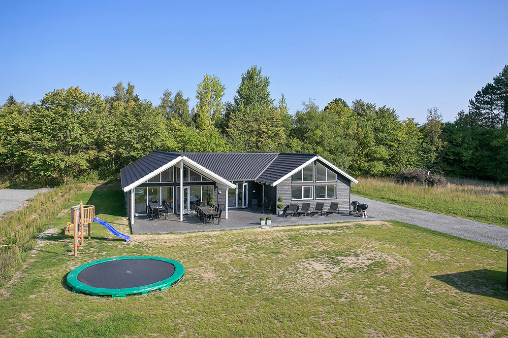 Dette lekre huset med svømmebasseng, nr. 378, med plass til 18 personer, ligger i Nordsjælland