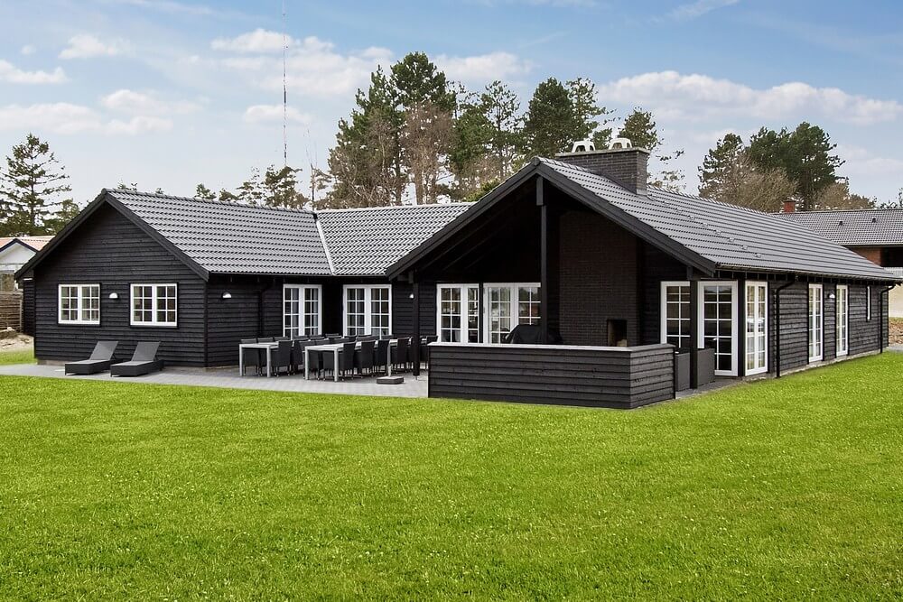 Dette lekre huset med svømmebasseng, nr. 386, med plass til 18 personer, ligger i Østjylland