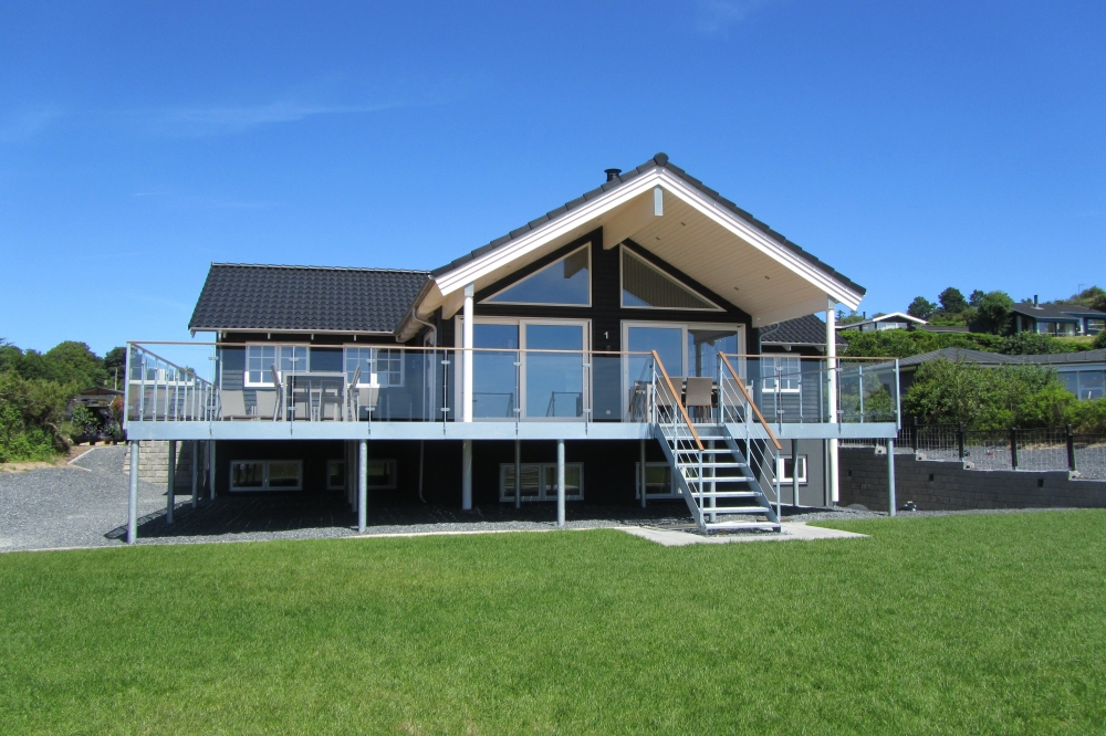 Dette lekre huset med svømmebasseng, nr. 400, med plass til 24 personer, ligger i Østjylland