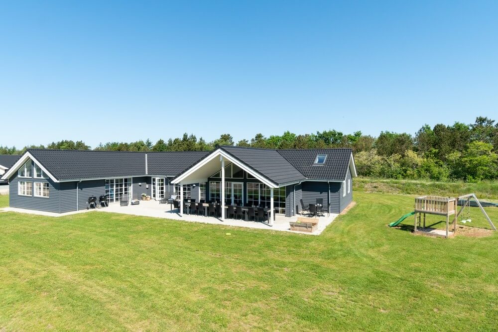 Dette lekre huset med svømmebasseng, nr. 465, med plass til 20 personer, ligger i Vestjylland
