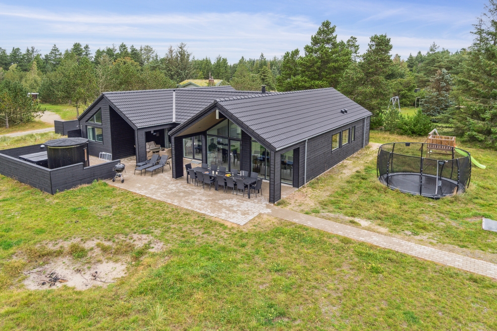 Dette lekre huset med svømmebasseng, nr. 540, med plass til 14 personer, ligger i Vestjylland