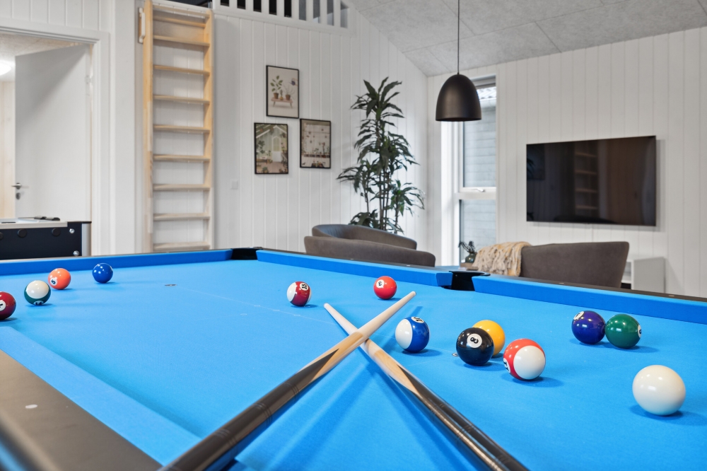 I tillegg til alle aktivitetsmulighetene i husets bassengavdeling, kan du også spille biljard, bordtennis og dart i luksushus nr. 633