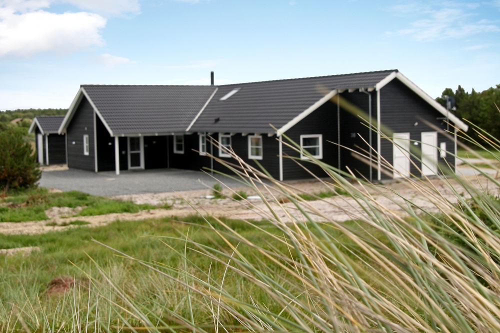 Dette lekre huset med svømmebasseng, nr. 168, med plass til 24 personer, ligger i Vestjylland