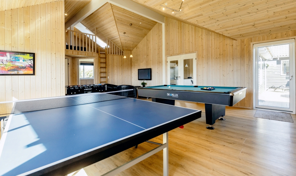 I tillegg til alle aktivitetsmulighetene i husets bassengavdeling, kan du også spille biljard, bordtennis og dart i luksushus nr. 267