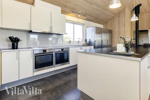 Kjøkkenet i luksushus nr. 267 er fullt utstyrt så dere lett kan lage mat til 20 personer.