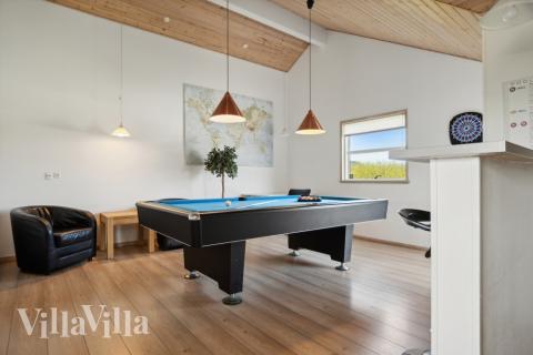 Konkurrer i feriehusets aktivitetsrom når dere besøker luksushus nr. 192 i Nordjylland.