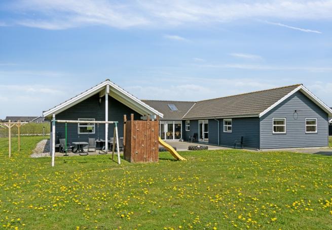 Dette lekre huset med svømmebasseng, nr. 192, med plass til 22 personer, ligger i Nordjylland