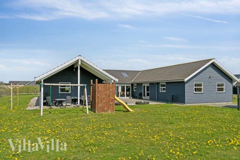 Dette lekre huset med svømmebasseng, nr. 192, med plass til 22 personer, ligger i Nordjylland