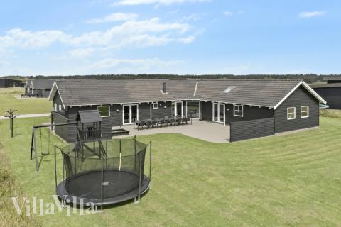 Dette lekre huset med svømmebasseng, nr. 193, med plass til 16 personer, ligger i Nordjylland
