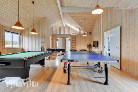 I tillegg til alle aktivitetsmulighetene i husets bassengavdeling, kan du også spille biljard, bordtennis og dart i luksushus nr. 231