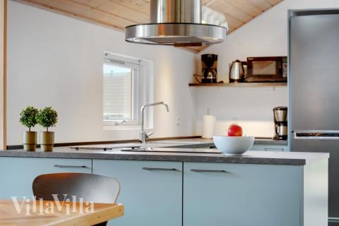 Kjøkkenet i luksushus nr. 264 er fullt utstyrt så dere lett kan lage mat til 14 personer.