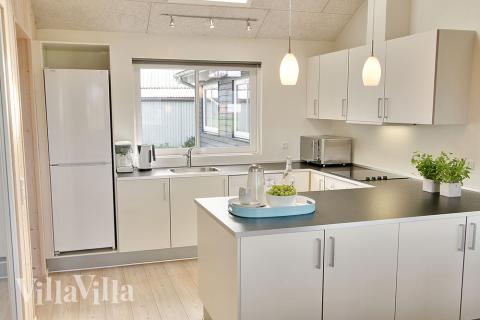 Kjøkkenet i luksushus nr. 265 er fullt utstyrt så dere lett kan lage mat til 14 personer.