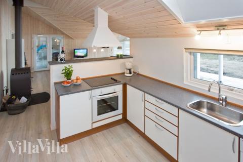 Kjøkkenet i luksushus nr. 226 er fullt utstyrt så dere lett kan lage mat til 14 personer.