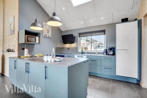 Kjøkkenet i luksushus nr. 260 er fullt utstyrt så dere lett kan lage mat til 16 personer.