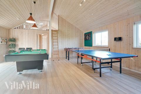 Konkurrer i feriehusets aktivitetsrom når dere besøker luksushus nr. 237 i Sydjylland.