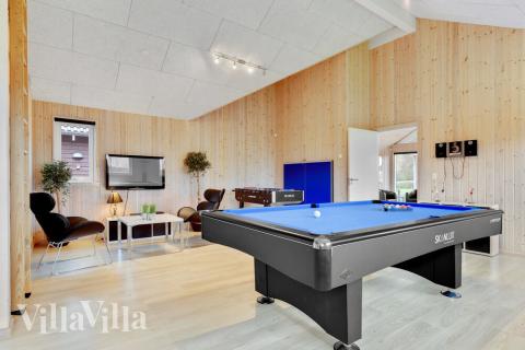 Konkurrer i feriehusets aktivitetsrom når dere besøker luksushus nr. 280 i Sydjylland.