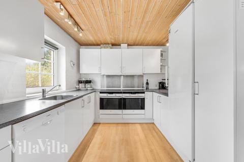 Kjøkkenet i luksushus nr. 145 er fullt utstyrt så dere lett kan lage mat til 22 personer.