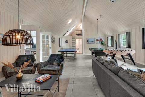 Konkurrer i feriehusets aktivitetsrom når dere besøker luksushus nr. 189 i Vestjylland.