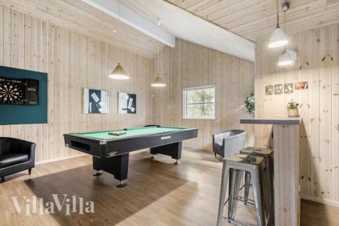 I tillegg til alle aktivitetsmulighetene i husets bassengavdeling, kan du også spille biljard, bordtennis og dart i luksushus nr. 197