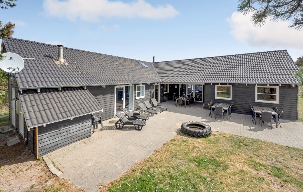 Dette lekre huset med svømmebasseng, nr. 167, med plass til 24 personer, ligger i Vestjylland