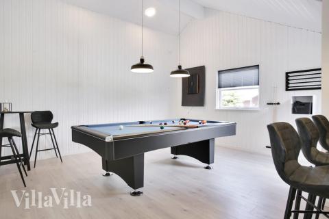 Konkurrer i feriehusets aktivitetsrom når dere besøker luksushus nr. 207 i Lolland/Falster/Møn.