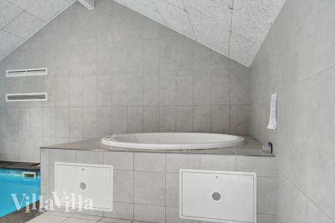 Nyt varmen i boblebadet i luksushus nr. 212 i Lolland/Falster/Møn