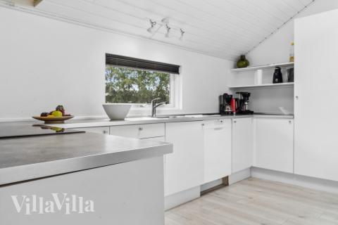 Kjøkkenet i luksushus nr. 212 er fullt utstyrt så dere lett kan lage mat til 14 personer.