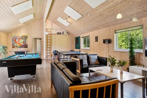 Konkurrer i feriehusets aktivitetsrom når dere besøker luksushus nr. 261 i Vestjylland.