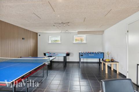 Konkurrer i feriehusets aktivitetsrom når dere besøker luksushus nr. 148 i Østjylland.