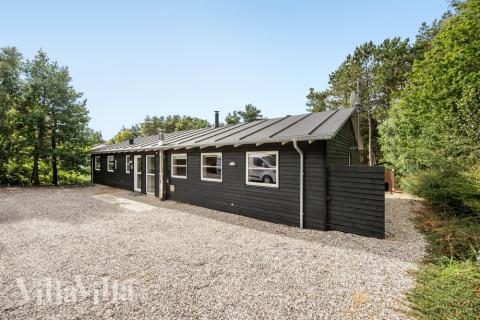 Dette lekre huset med svømmebasseng, nr. 247, med plass til 20 personer, ligger i Østjylland