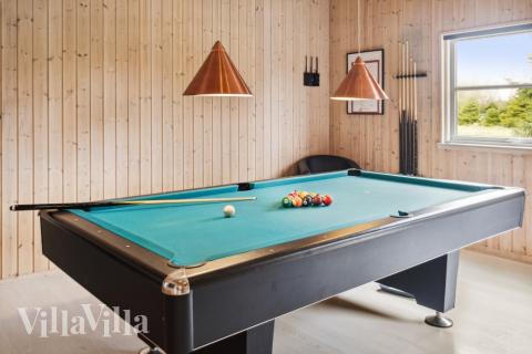 Konkurrer i feriehusets aktivitetsrom når dere besøker luksushus nr. 202 i Lolland/Falster/Møn.