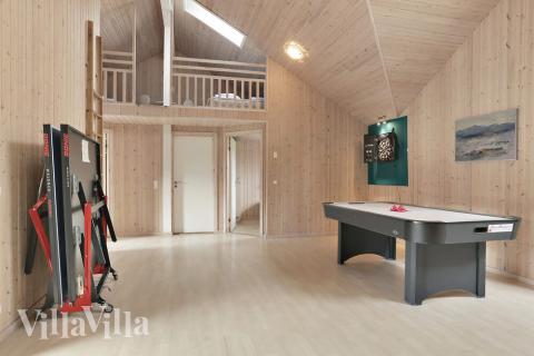 Konkurrer i feriehusets aktivitetsrom når dere besøker luksushus nr. 177 i Lolland/Falster/Møn.