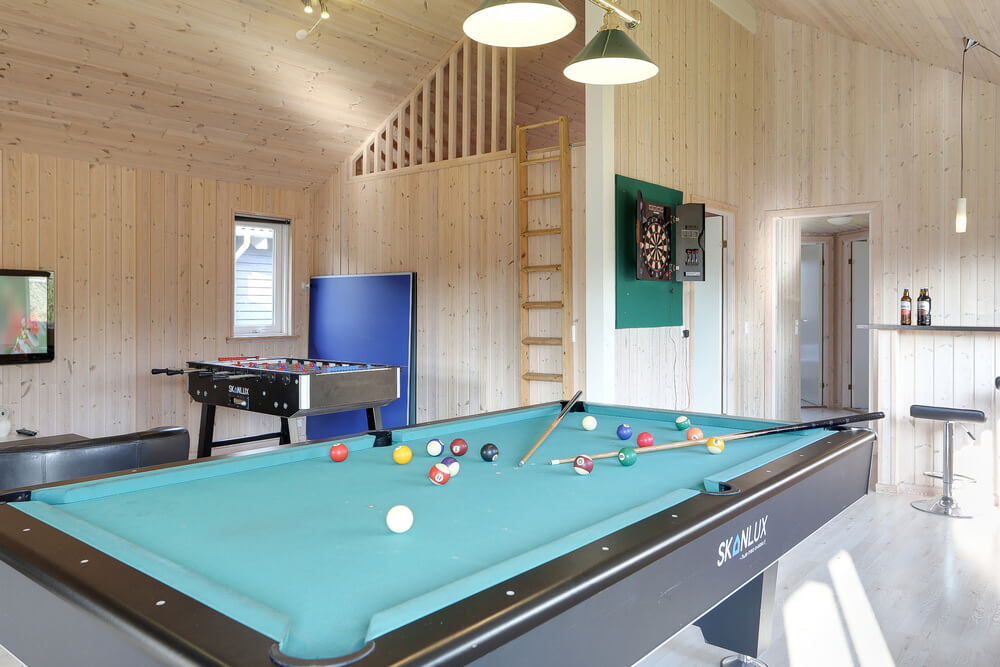 I tillegg til alle aktivitetsmulighetene i husets bassengavdeling, kan du også spille biljard, bordtennis og dart i luksushus nr. 272