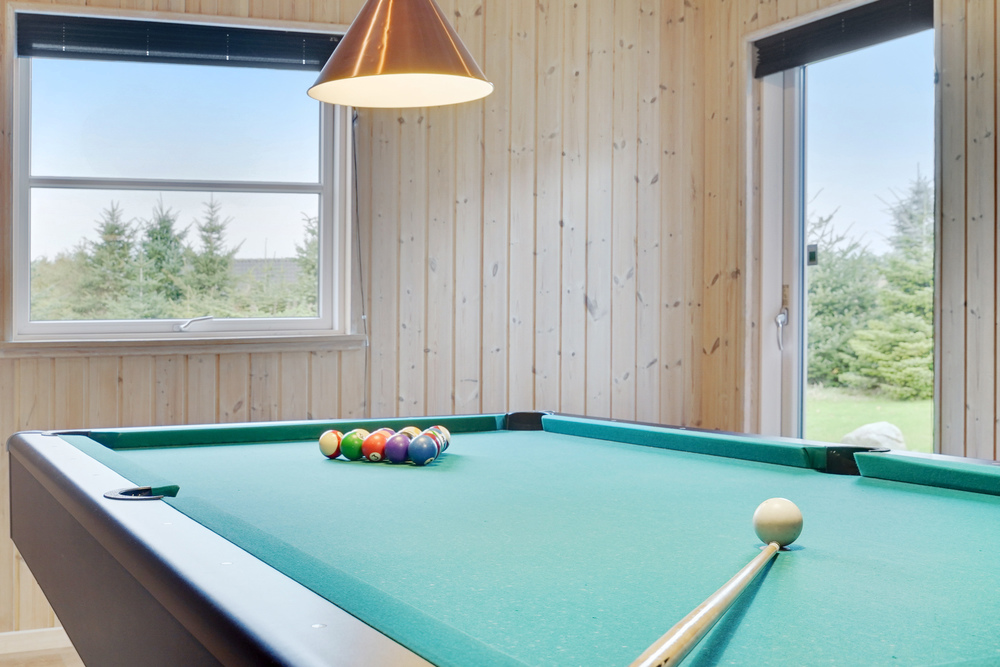 I tillegg til alle aktivitetsmulighetene i husets bassengavdeling, kan du også spille biljard, bordtennis og dart i luksushus nr. 206