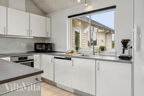 Kjøkkenet i luksushus nr. 306 er fullt utstyrt så dere lett kan lage mat til 16 personer.