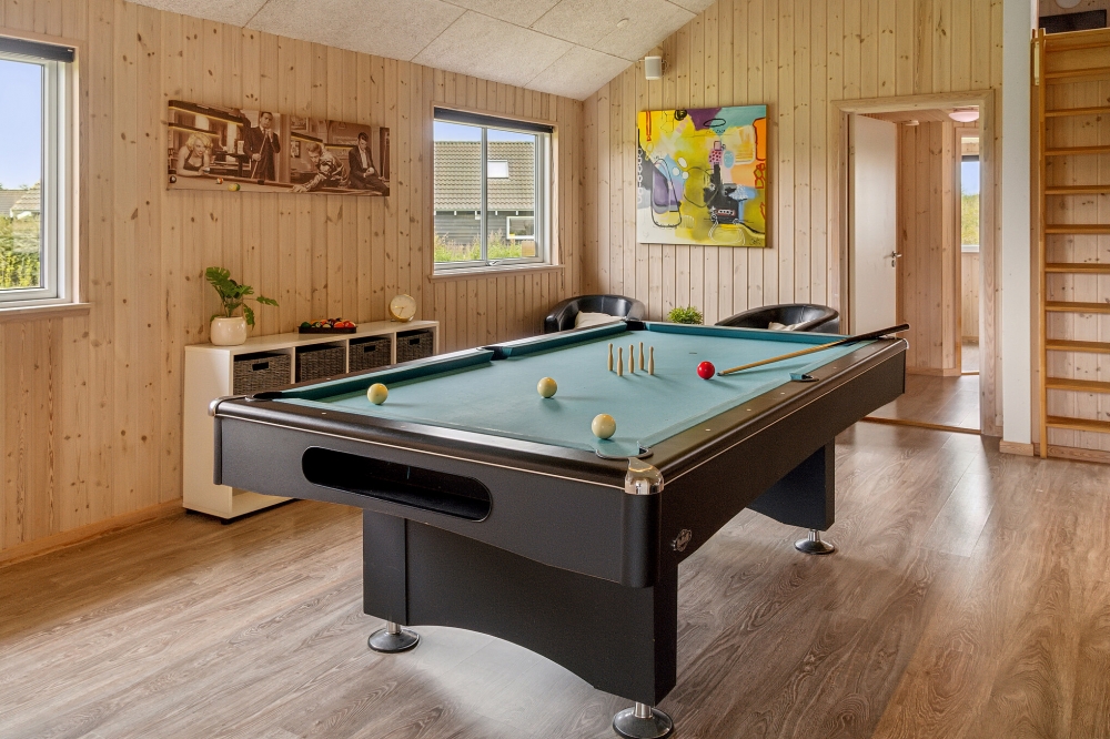 I tillegg til alle aktivitetsmulighetene i husets bassengavdeling, kan du også spille biljard, bordtennis og dart i luksushus nr. 306