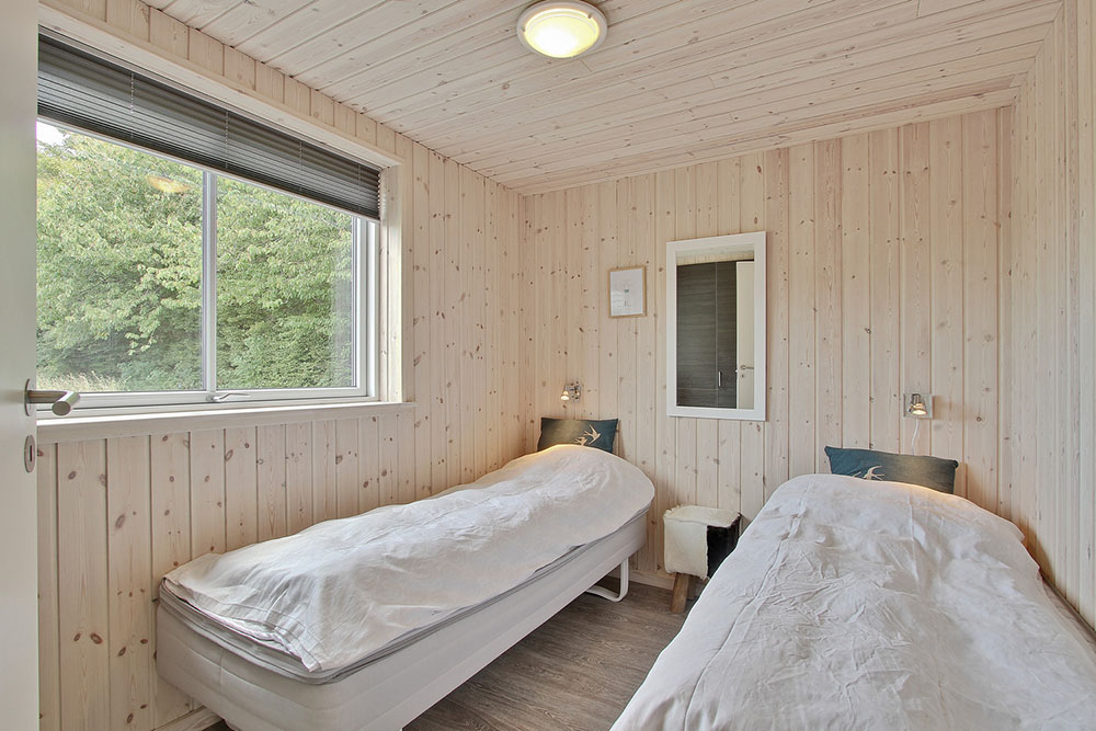 Et av de 7 soverommene i luksushus nr. 308 i Fyn og øyer.
