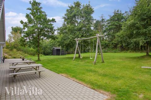 Dette lekre huset med svømmebasseng, nr. 313, med plass til 18 personer, ligger i Vestjylland