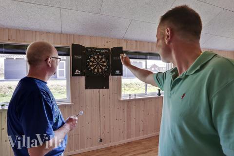 Konkurrer i feriehusets aktivitetsrom når dere besøker luksushus nr. 315 i Fyn og øyer.