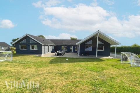 Dette lekre huset med svømmebasseng, nr. 316, med plass til 22 personer, ligger i Fyn og øyer