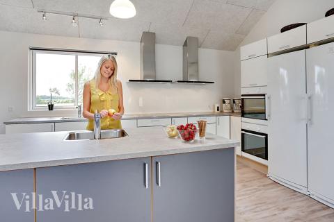 Kjøkkenet i luksushus nr. 318 er fullt utstyrt så dere lett kan lage mat til 22 personer.