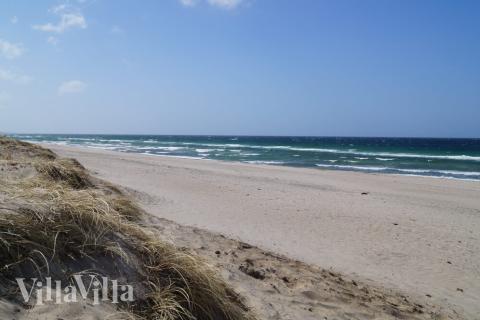 Stranden nær luksushus nr. 323.