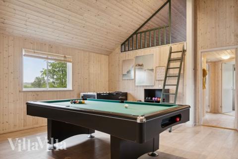 Luksushus nr. 323 til 16 personer tilbyr et stort aktivitetsrom med bl.a. biljard og dart
