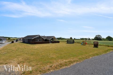 Dette lekre huset med svømmebasseng, nr. 324, med plass til 18 personer, ligger i Fyn og øyer