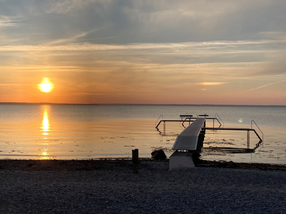 Stranden nær luksushus nr. 324 i Fyn og øyer er ideell til gåturer.