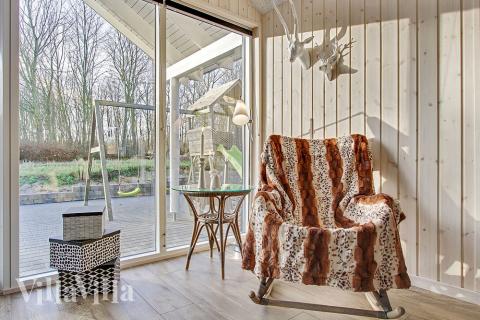 Oppholdsrom med plass til 16 i luksushus nr. 337.