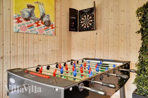 Konkurrer i feriehusets aktivitetsrom når dere besøker luksushus nr. 338 i Fyn og øyer.