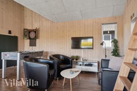 Konkurrer i feriehusets aktivitetsrom når dere besøker luksushus nr. 345 i Fyn og øyer.